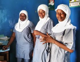 A group of student nurse midwives gather as they start their training at a local health facility in Nigeria.